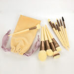 12 Piece Vegan Plush Cosmetic Brush Set in Yellow & Bronze with Velvet Pouch